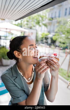 African American Man Eating Sweet Belgian Waffle Very Happy Pointing 