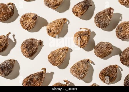 To view of closeup tasty sweet figs arranged in order on white background Stock Photo