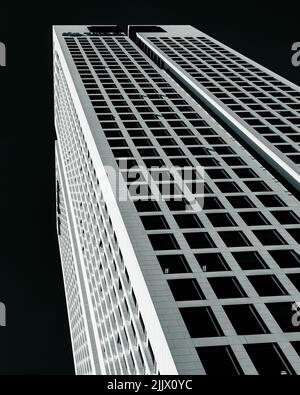 A greyscale low-angle shot of OpernTurm in Frankfurt Stock Photo