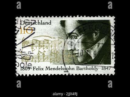 Jakob Ludwig Felix Mendelssohn Bartholdy (1809-1847), famous German composer, pianist, author of Wedding March, circa 1997. Vintage stamp isolated Stock Photo