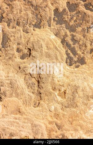 Abstract relief rough gritty brown surface of background texture Stock Photo