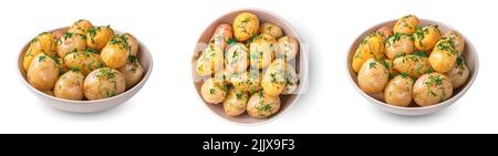 Boiled new potatoes with fresh dill and butter are isolated on a white background. Stock Photo