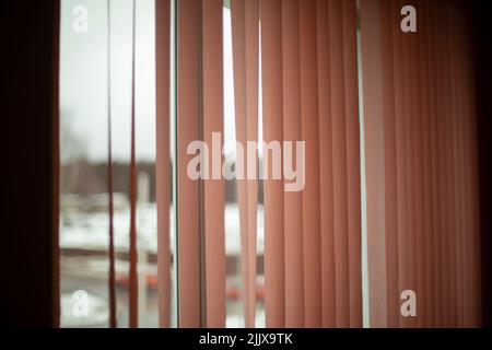 Curtains on window. Interior details. Window in room. Daylight on cloudy day. Stock Photo