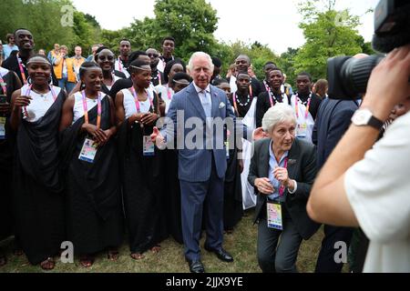 The Prince of Wales poses with athletes and members of the team from Rwanda during a visit to the Athletes Village at the University of Birmingham at the Birmingham 2022 Commonwealth Games. Picture date: Thursday July 28, 2022. Stock Photo