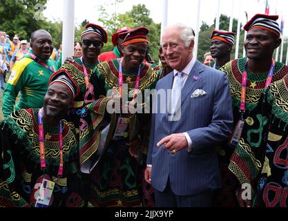 The Prince of Wales poses with athletes and members of the team from Cameroon during a visit to the Athletes Village at the University of Birmingham at the Birmingham 2022 Commonwealth Games. Picture date: Thursday July 28, 2022. Stock Photo