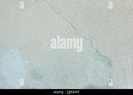White grunge old concrete stucco wall texture background. Abstract weathered gray cement cracked building wall background Stock Photo