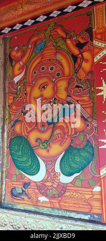 Guruvayoor-Kerala-Traditional mural paintings were painted on the Guruvayoor Temple outer walls for the tourist to see and learn our Stock Photo