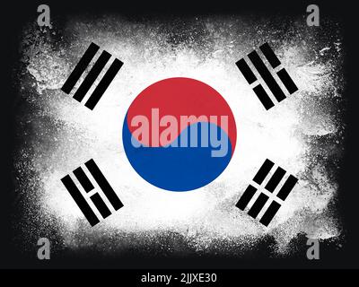 South Korea Republic Flag design composition of exploding powder and paint, isolated on a black background for copy space. World cup 2022 football sym Stock Photo