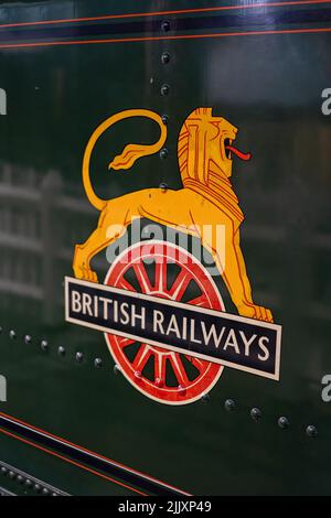 A British Railways logo on a steam train at Steam Railway Museum in Swindon Stock Photo