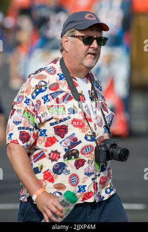 Lake Forest, Illinois, USA. 28th July, 2022. - A Chicago Bears fan walks around during training camp at Halas Hall in Lake Forest, IL. Credit: csm/Alamy Live News Stock Photo