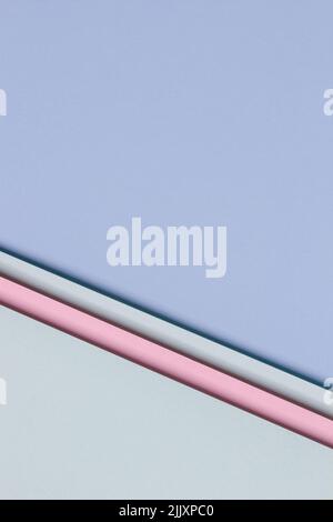 Abstract colored paper texture background. Minimal geometric shapes and lines in light blue, pastel pink, green colors Stock Photo