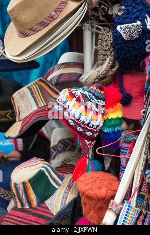 Multiple styles of peruvian hats at a local market in Cusco, Peru. Stock Photo