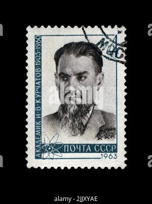 Kurchatov  I. V. (1903-1960), circa 1963. famous soviet scientist, physicist. canceled vintage postal stamp printed in the USSR. Stock Photo
