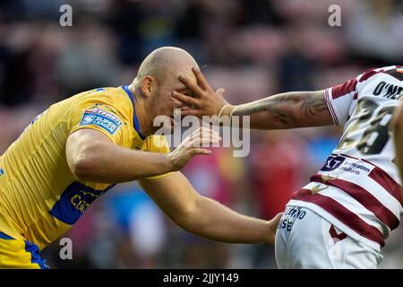 Wigan, UK. 28th July, 2022. George King #10 of Hull KR takes a finger in the face from Brad OÕNeill #28 of Wigan Warriors in Wigan, United Kingdom on 7/28/2022. (Photo by Steve Flynn/News Images/Sipa USA) Credit: Sipa USA/Alamy Live News Stock Photo
