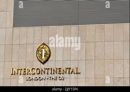 London, England - June 2022: Sign on the outside wall of the Intercontinental Hotel next to the O2 Arena in Greenwich Stock Photo