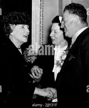 Helen Keller the visiting American Blind and deaf authoress was given a civic reception at the Tow Hall today. Helen Keller being, introduced to the Lord Mayor Ald. Bartley. Miss Polly Thompson(centre) conveying the conversation to Miss Keller. March 31, 1948. Stock Photo