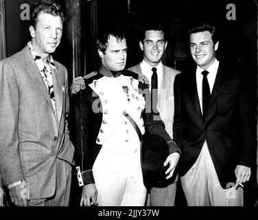 Don Dailey, Marlon Brando, Jeff *****, Bob Wagner. Brando - As Napoleon -- He was just laughable - always talking out of the corner of his mouth. July 29, 1955. (Photo by Jay Scott). Stock Photo