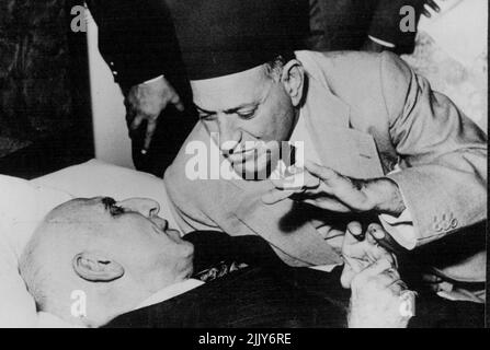 Dr. Mossadeq In Cairo - Nahas Pasha, the Egyptian Prime Minister, confers with Dr. Mossadeq, resting at Shepheard's Hotel, after his arrival in Cairo. Dr. Mossadeq, the Persian Prime Minister received a frenzied greeting from large crowds, when he arrived in Cairo, breaking his journey home from the U.S.A. November 23, 1951. (Photo by Sport & General Press Agency, Limited) Stock Photo