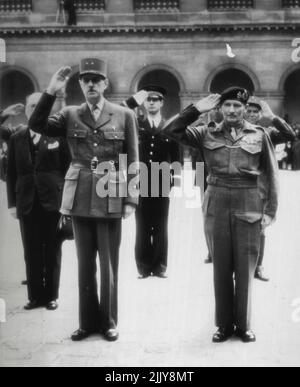 Montgomery Is Decorated By France -- General Charles De Gaulle (Left) and Field Marshal Sir Bernard L. Montgomery Salute during the ceremony at the Invalids, Paris, in which the British commander was invested with the Grand Cross of the Legion of Honor by Gen. De Gaulle. This photo was taken by Henry L. Griffin, Associated Press Photographer with the Wartime still picture pool. May 30, 1945. (Photo by AP Wirephoto). Stock Photo