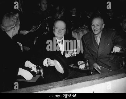 Alamein Anniversary -- The tenth anniversary of the Alamein Reunion was held at the Empress Hall, London last night, this picture Mr. Winston Churohill seated between Mrs. Churchill and Field Marshall Viscount Montgomery. October 25, 1952. (Photo by Daily Mail Contract Picture). Stock Photo