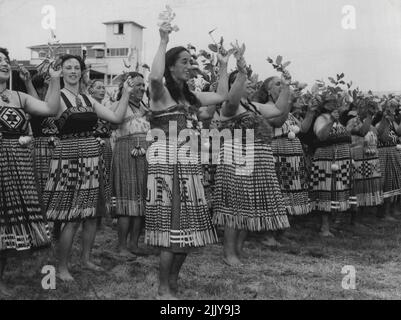 At Rotorua - Famous Maori guide, Rangi, in foreground, leads one of the dancers for the Queen. January 12, 1954. (Photo by Associated Newspapers Ltd.). Stock Photo