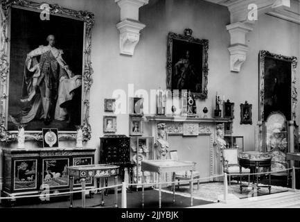 ew from tomorrow at the Victoria and Albert Museum. The portrait (left) is of George ill by Allan Ramsay. It hangs over a Chinese lacquer cabinet with scenes of landscapes and animals on doors and sides. The tortoiseshell cabinet nearby in inled with more than four hundred pieces of engraves mother-of-pearl (French 18th century). Over the English 18th-country mantelpiece is a three- quarter length portrait of George III, by the same artist as the other one. The other portrait (right) is of Augusta, wife of Frederick, Prince of Wales, eldest son of George II, also by Allen Ramsay. May 25, 1954. Stock Photo