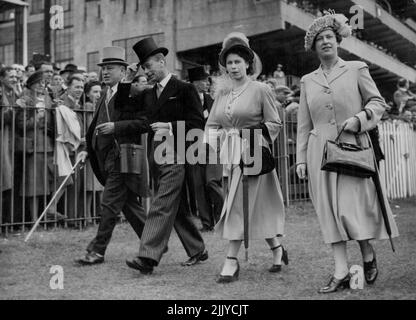 'My Love' Wins The Derby: Classic Double For the Aga Khan -- Left To Right, Lord Derby, His Majesty The King, And Princes Elizabeth walking down the course at Epsom Today, June 5. The Aga Khan captured the second leg of the Turf's most prized double at Epsom Today, June 5, when his colt, 'My Love' Brilliantly Ridden by W.R. Johnstone, scored a close victory in the 169th renewal of the Derby Stakes. On Thursday The game owner's filly Masaka had romped away with the oaks. June 30, 1948. (Photo by Associated Press Photo). Stock Photo