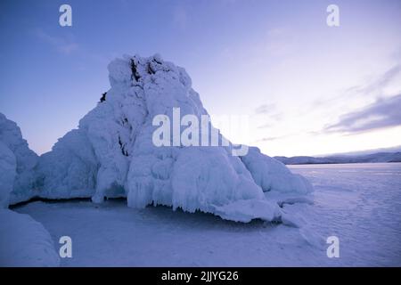 ice mountain over frozen lake Stock Photo