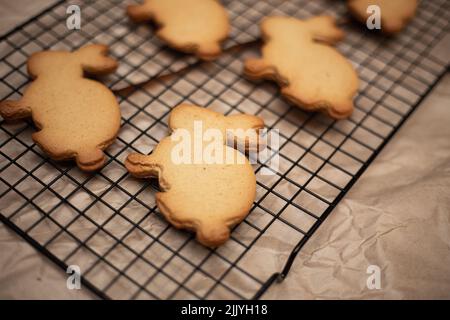 Easter bunnies gingerbread freshly baked on the table Stock Photo