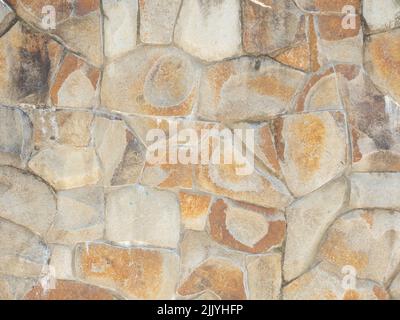 Wall cladding with coarse decorative stone. Not a seamless texture. Stock Photo