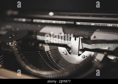 Closeup view of old vintage typewriter with black keys Stock Photo