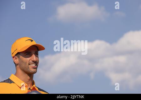 Mogyorod, Hungary. 28th July, 2022. McLaren's Australian driver Daniel Ricciardo meets the fans during a pit lane walk session at Hungaroring in Mogyorod, Hungary, July 28, 2022. Credit: Attila Volgyi/Xinhua/Alamy Live News Stock Photo