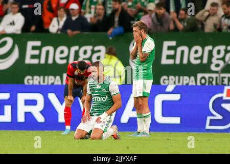 Gdansk, Poland. 28th July, 2022. Lukasz Zwolinski (C) seen in action during the UEFA Europa Conference League match between Lecha Gdansk and SK Rapid Vienna in Gdansk. (Final score; Lechia Gdansk 1:2 SK Rapid Vienna) Credit: SOPA Images Limited/Alamy Live News Stock Photo