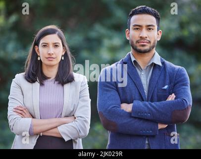 Taking charge of our professional destinys. two businesspeople looking confident together. Stock Photo