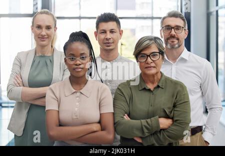 Were unbeatable in business. a group of businesspeople together. Stock Photo