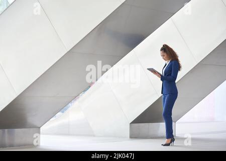 Asian young business woman checking information in business document Stock Photo