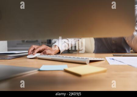 Businessman working on computer in his office, selective focus Stock Photo