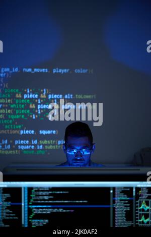 Young Indian It specialist busy with work on new project Stock Photo