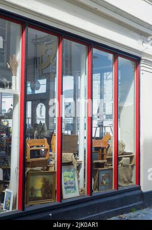 Bric a Brac shop, antiques, junk UK storefront window Stock Photo