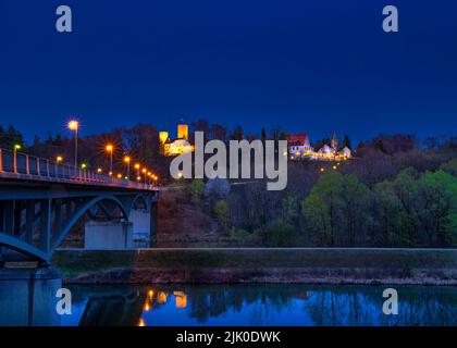 View of Grünwald with Grünwald Castle and Grünwald Bridge at night, Isar Valley, Grünwald, district of Munich, Upper Bavaria, Bavaria, Germany, Europe Stock Photo