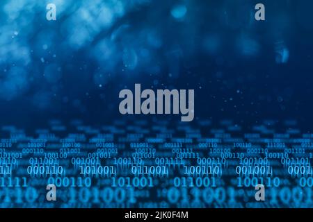 Binary digital data flow in dark blue background, abstract technology concept Stock Photo