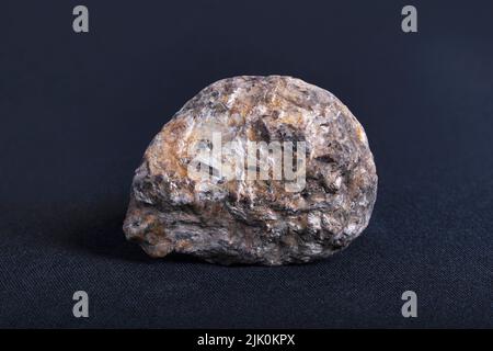 Gneiss with granite needle. Gneiss is a common and widely distributed type of metamorphic rock Stock Photo
