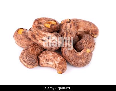 Cashew nuts in shell isolated on white background. Roasted and salted cashew nuts Stock Photo