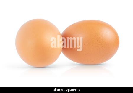 Two brown eggs isolated on white background. Close up Stock Photo