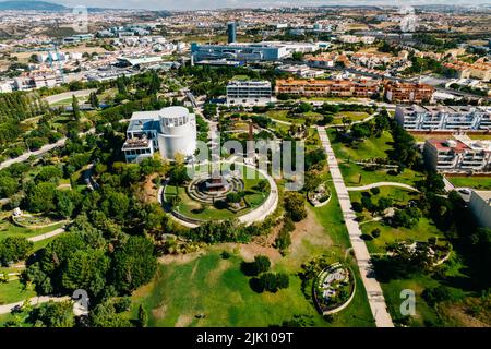 Lisbon, Portugal - July 29, 2022: Aerial drone view of Parque dos Poetas in Oerias, translated to Poet's Park Stock Photo