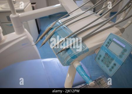 Close up of the tools used by a dentist, Dental drills next to the patient's chair Stock Photo