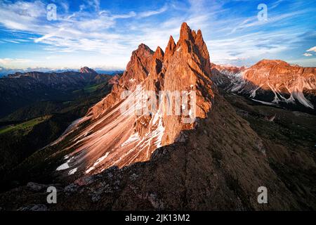 Majestic peaks of Odle group, Seceda, Furchetta and Sass Rigais at sunset, aerial view, Dolomites, South Tyrol, Italy, Europe Stock Photo