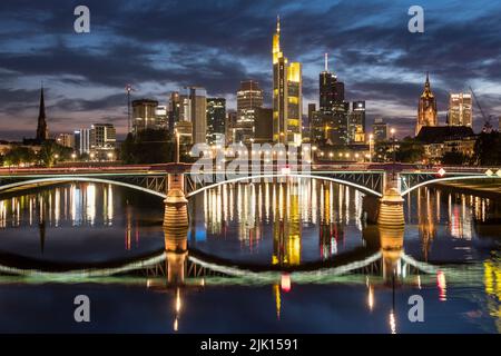The River Main, Ignatz Bubis Bridge, Dom Cathedral and skyscrapers of Frankfurt's Business District, Frankfurt, Hesse, Germany, Europe Stock Photo