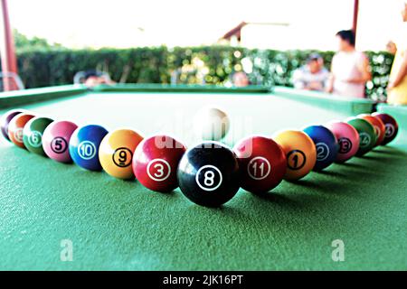 snooker balls lined up on the table Stock Photo