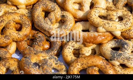 Homemade Soft Pretzels with Salt on a wooden board Stock Photo